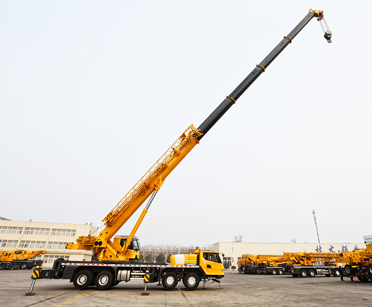 Hydraulic truck crane on construction site