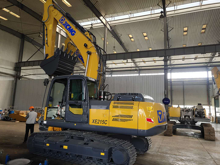 Detailed view of the excavator bucket and boom mechanism