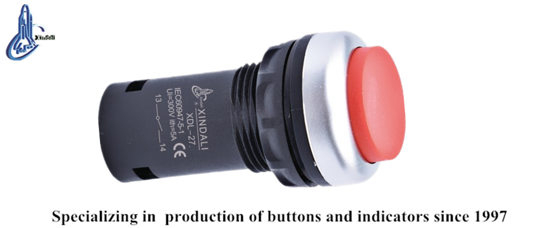 Close up view of the waterproof projecting red pushbutton switch