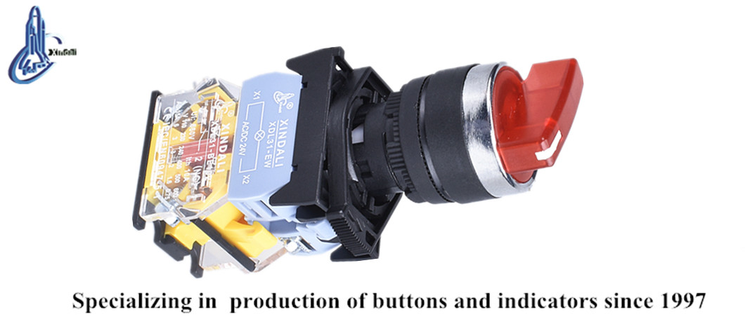 Close up of the long selector push button with lamp