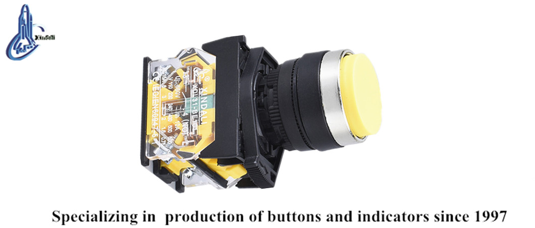 Yellow convex push button switch close up