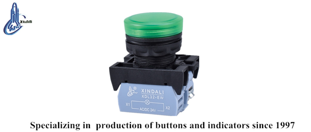 Green illuminated pushbutton switch in operation