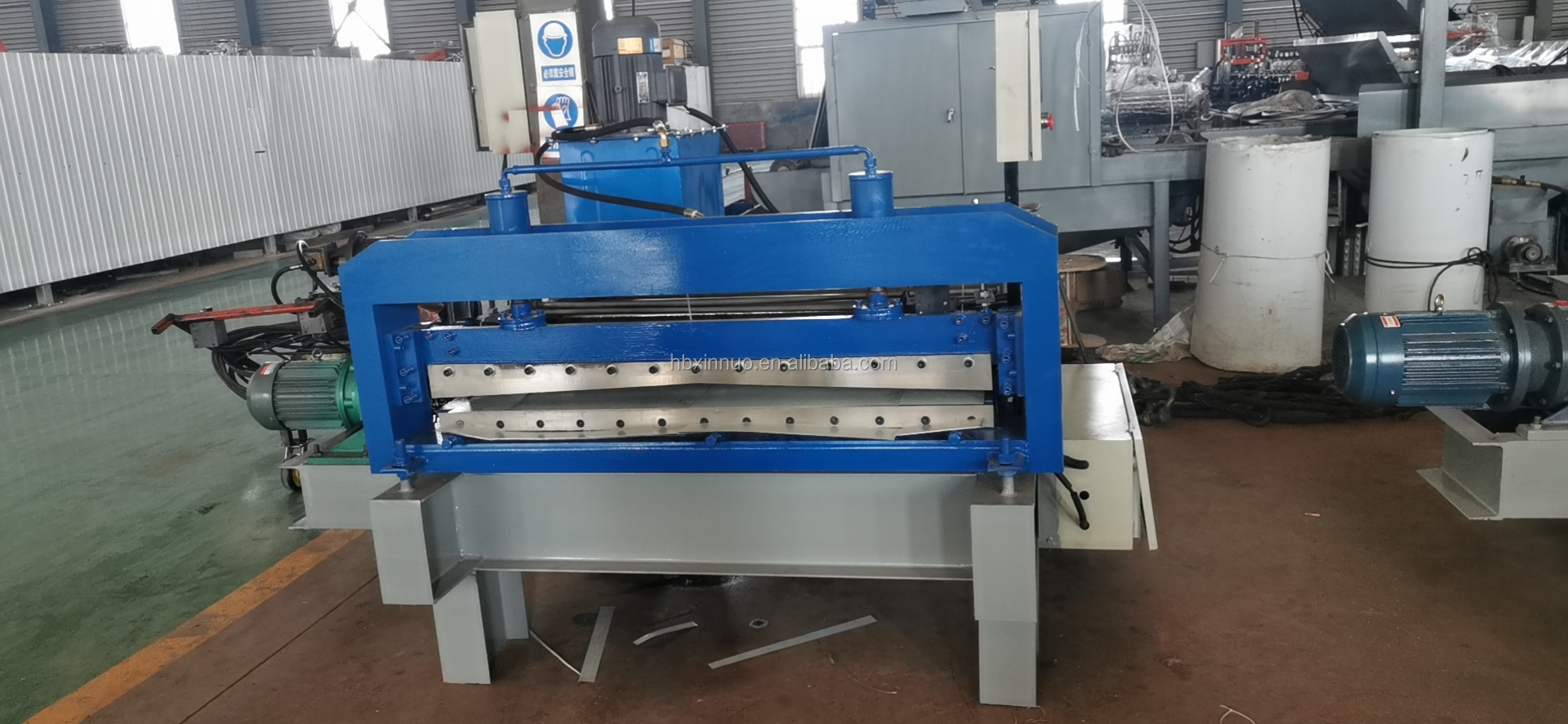 Close-up of hydraulic system and machine rollers