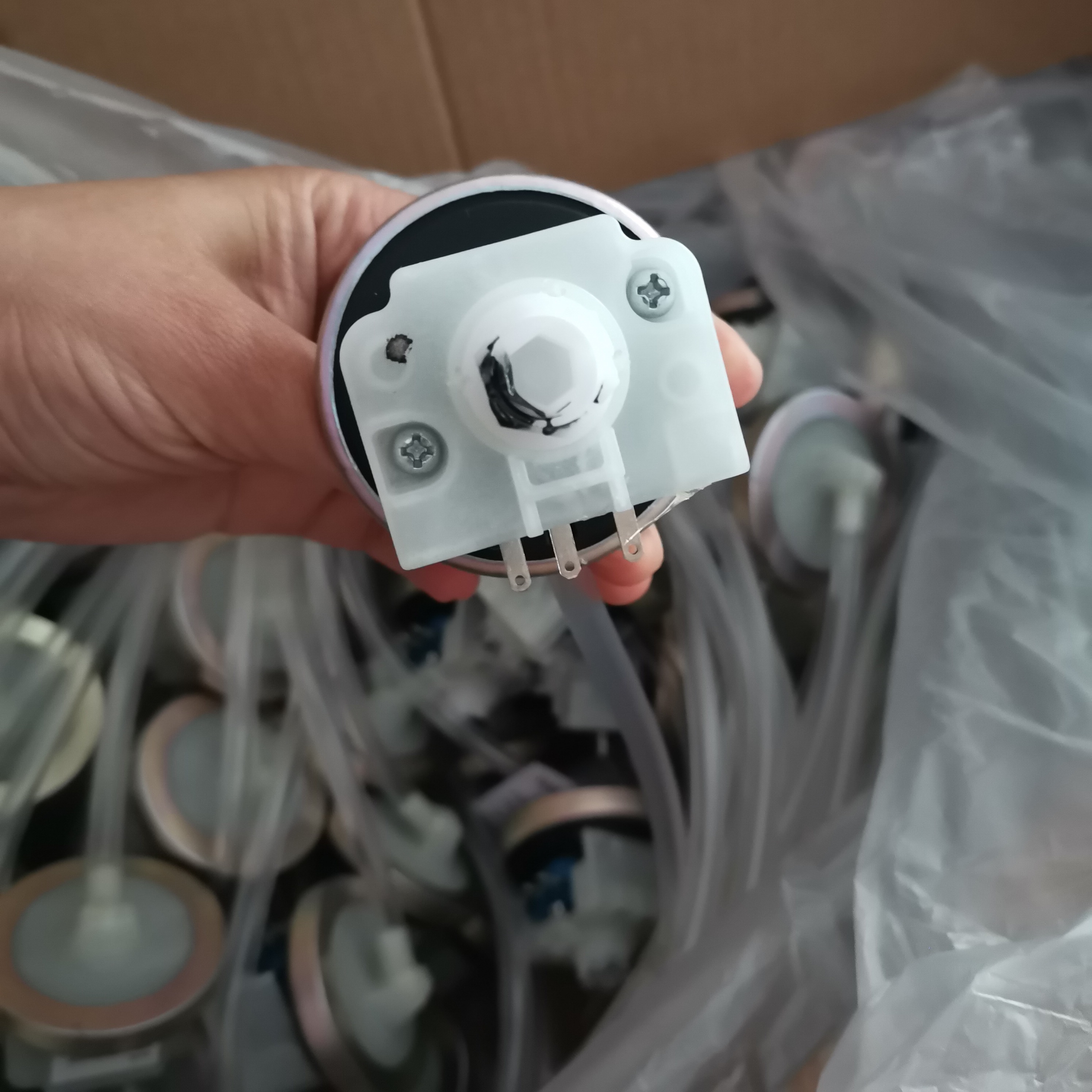 Close up of the XQB52-2508PG water level pressure sensor assembly