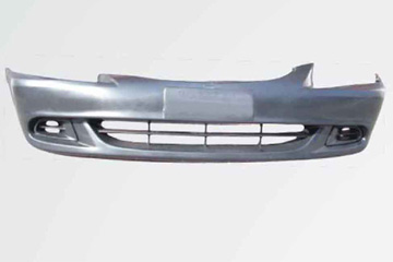 Automotive Front Bumper with Fog Light Housings