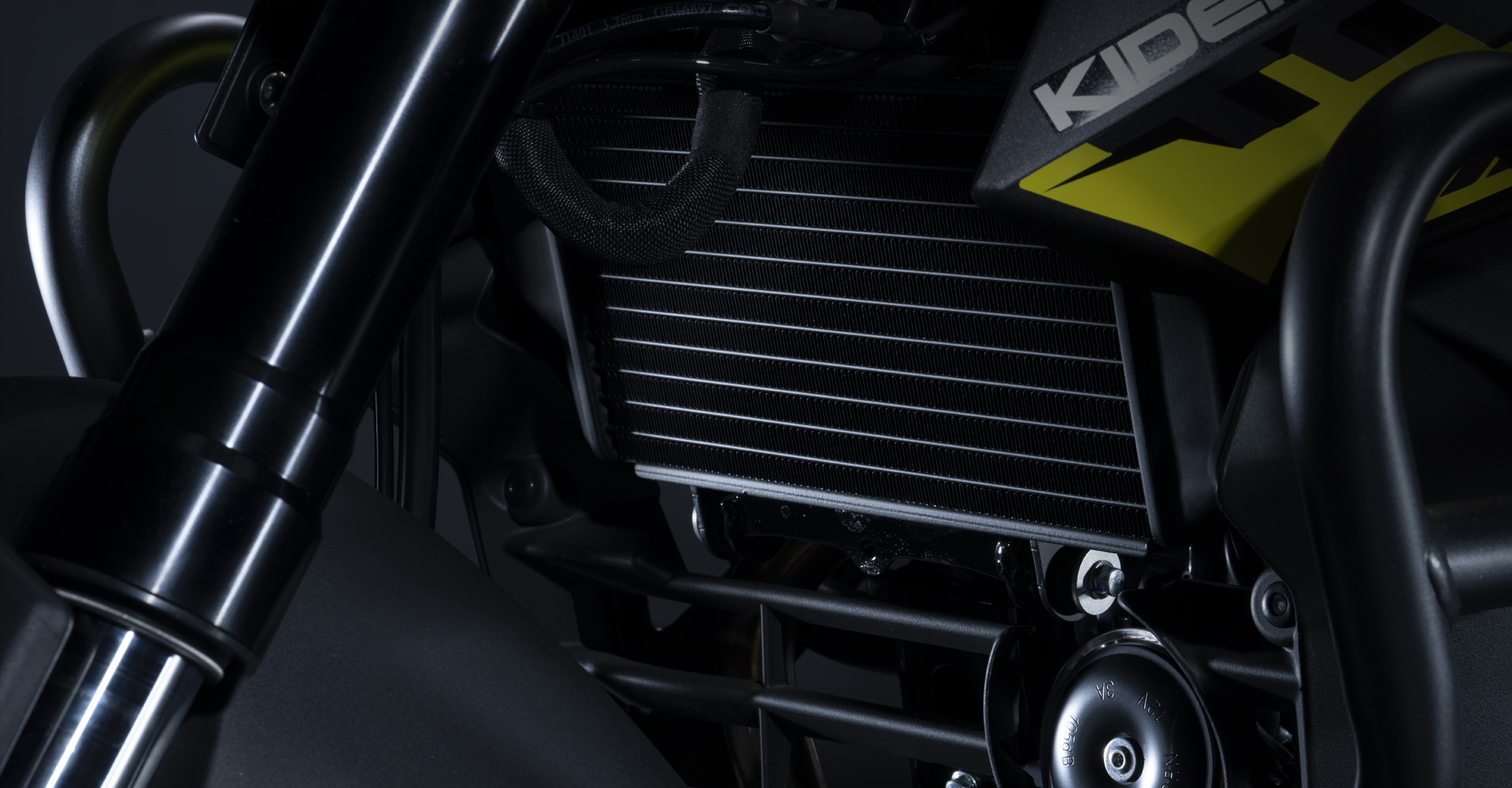 Engine radiator and front suspension